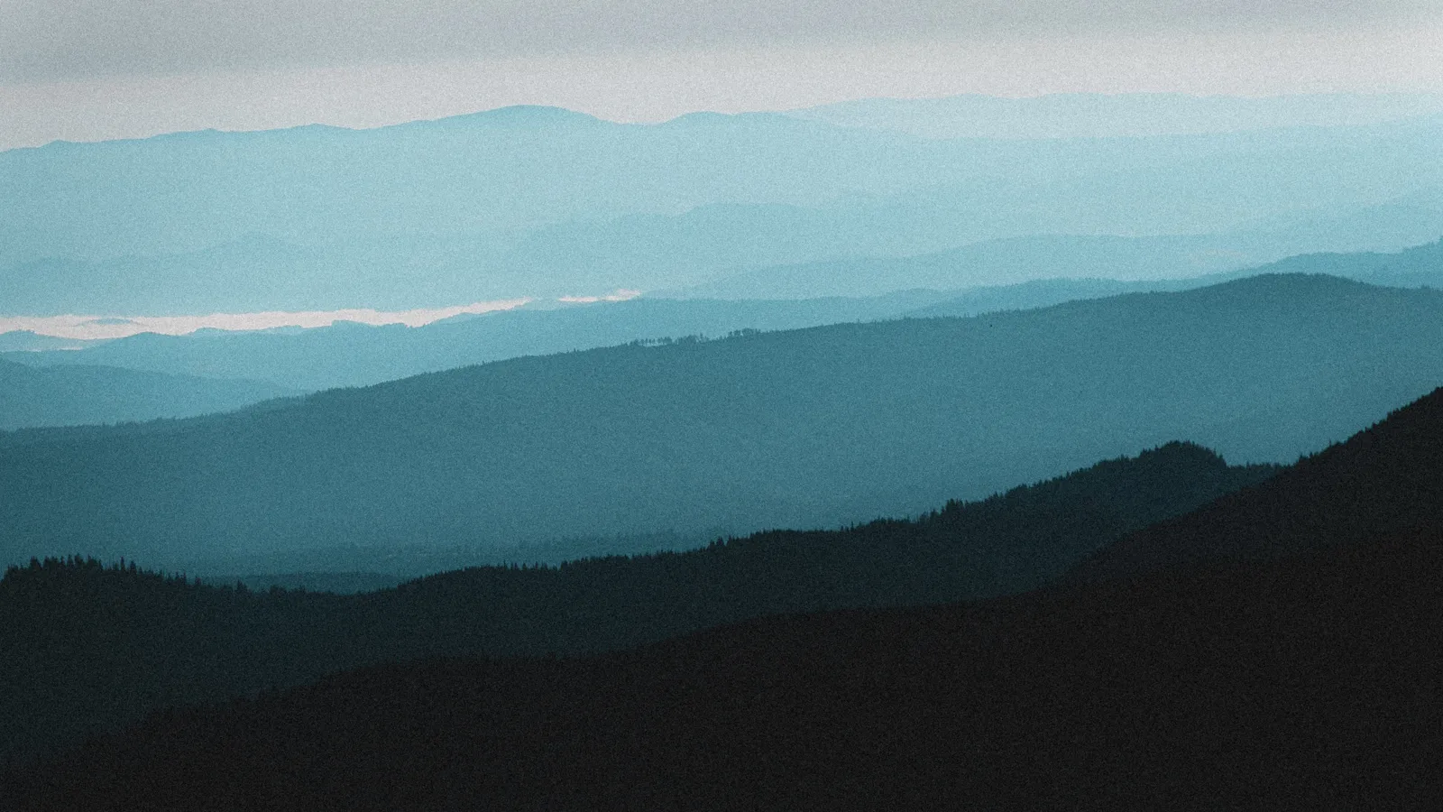 Layers of distant blue mountains